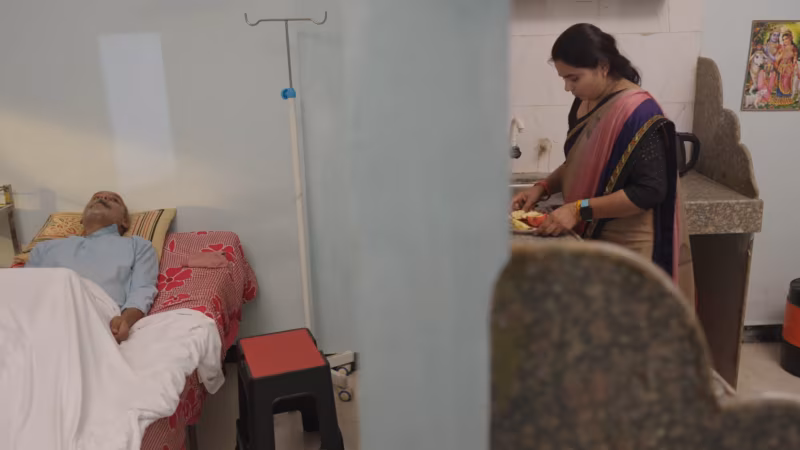 She cooks in the corner of the same room while he sleeps