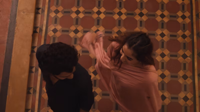 A still from Bahut Khoobsurat Ho Tum: an overhead shot of the two leads on a patterned tiled floor